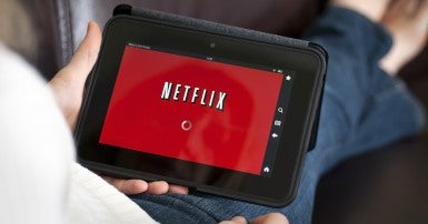 Close shot of a tablet with the red Netflix start screen