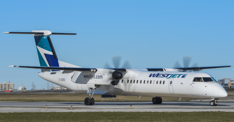 Westjet Encore plane on the runway