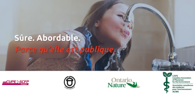 girl drinking water from a faucet 