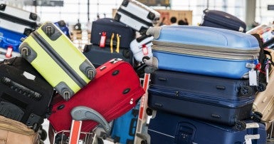 Baggage piles up at overloaded airport