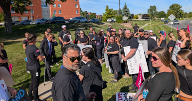 People standing at a rally