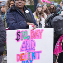 Woman holding a protest sign