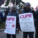 Image:  Striking members of CUPE 4914