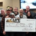 Image of group of people from CUPE 255 holding a giant cheque