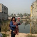 Two workers giving a tour outside of a Bangladesh garment factory Bangladesh garment factory delegation