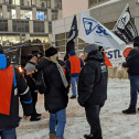 Workers protesting in front of Laval city council