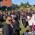 People standing at a rally