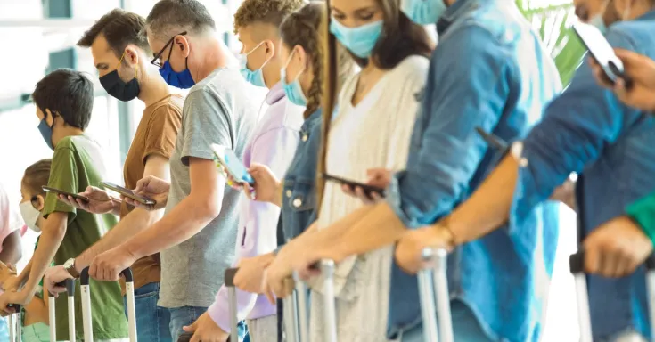 People waiting in line at an airport