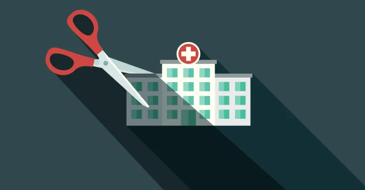 Flat drawing of hospital with big scissors ready to cut it in half