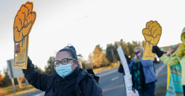 Worker with yellow fist sign