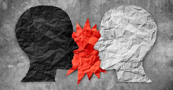 Two silhouettes in profile with a spiky red shape between them